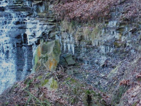 The fissile Bedford Shale helps to create the "wedding vale" effect for the falls.  A large block of Berea Sandstone lays here as a result of undercutting.  Notice the frost-wedging action!!